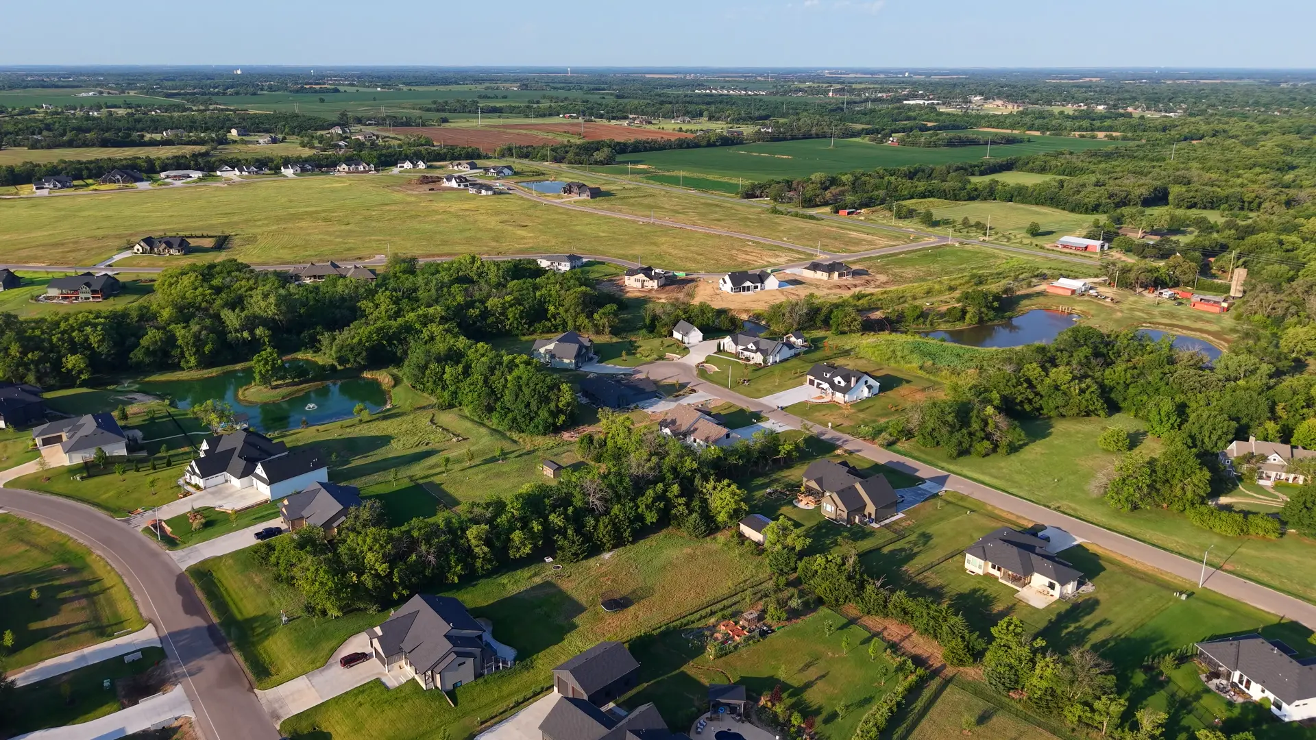 Wide aerial view of Cedar Ranch Estates and the surrounding Derby countryside